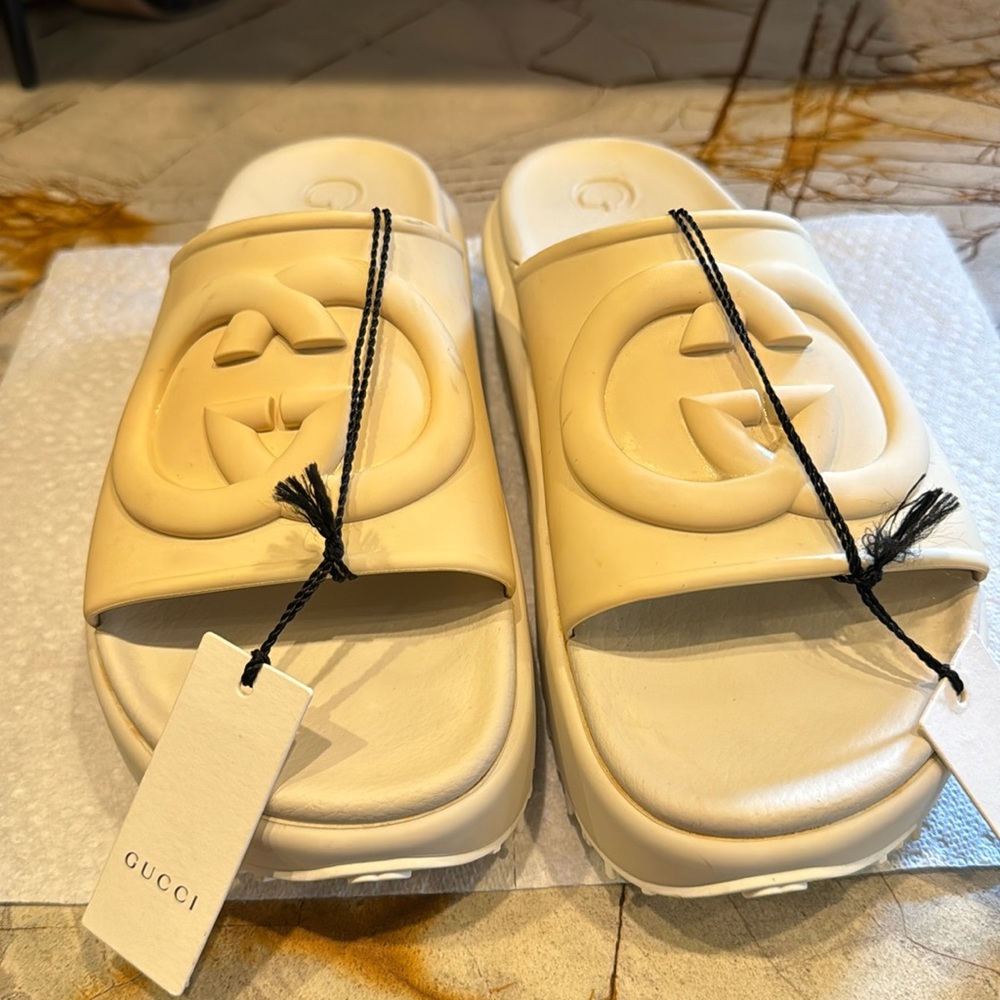 Gucci slides . Never worn . Includes box. Retail for $590 offer thru poshmark